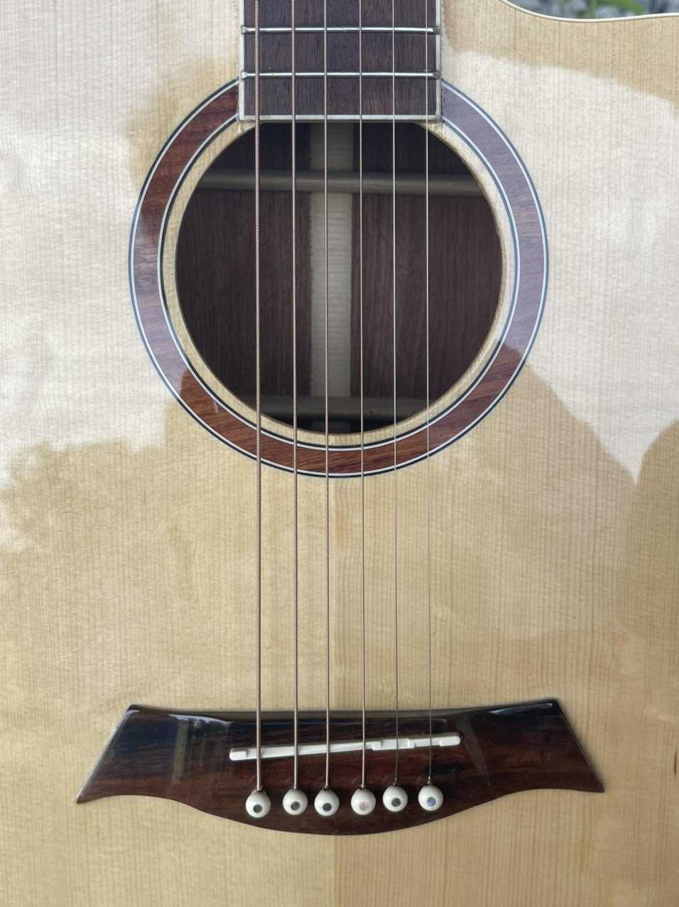 GUITAR ACOUSTIC GỖ SAPELE DÁNG A KHUYẾT