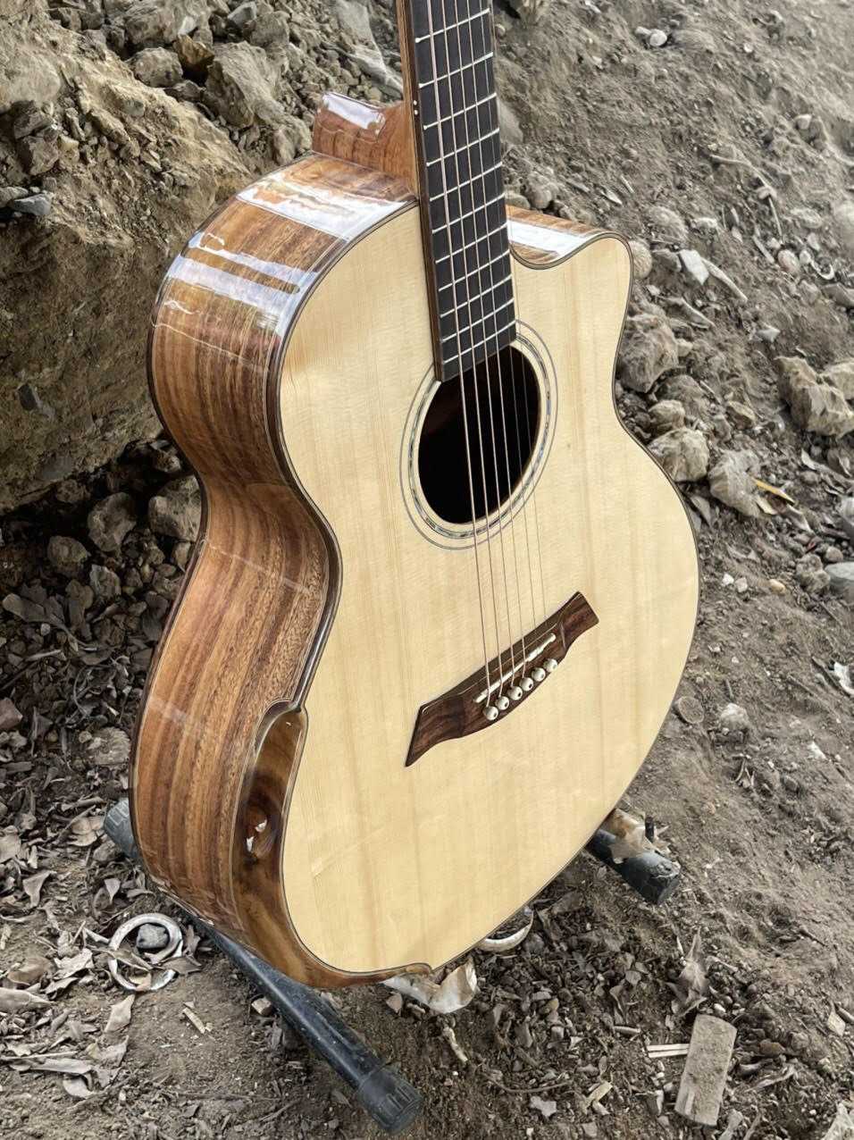 GUITAR ACOUSTIC GỖ ĐIỆP DÁNG A KHUYẾT VÁT TAY