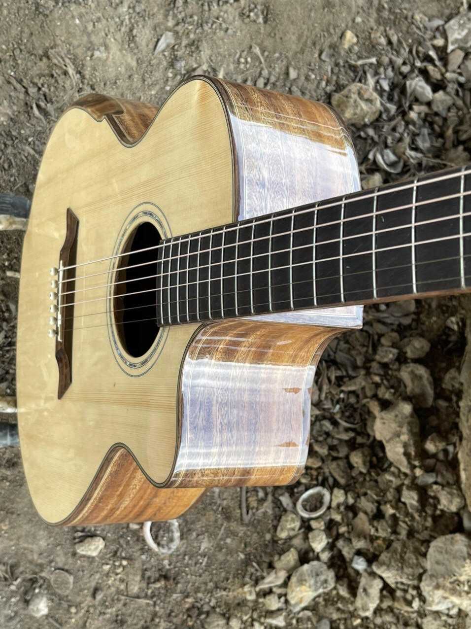 GUITAR ACOUSTIC GỖ ĐIỆP DÁNG A KHUYẾT VÁT TAY