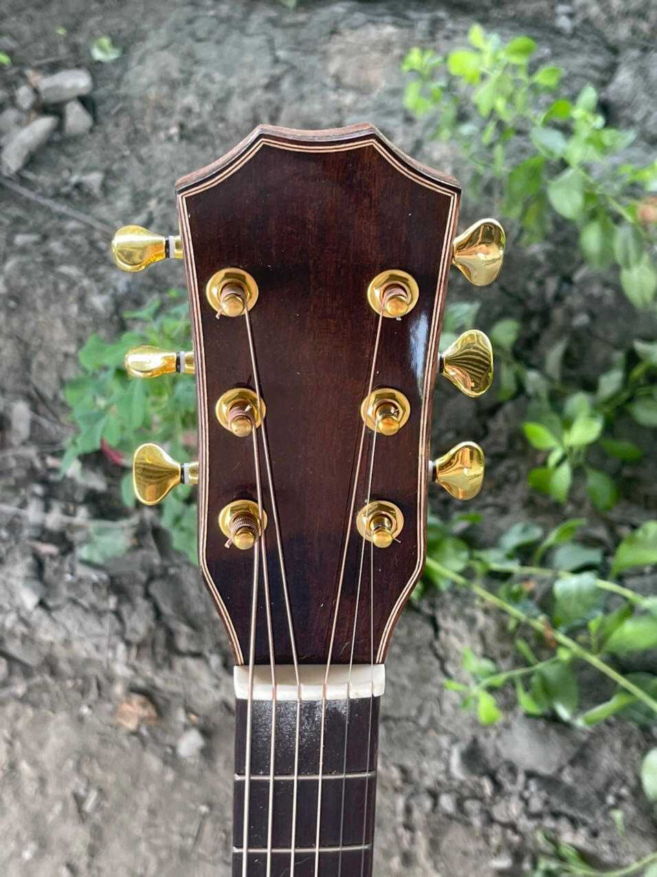 GUITAR ACOUSTIC GỖ CÒNG CƯỜM DÁNG A KHUYẾT 