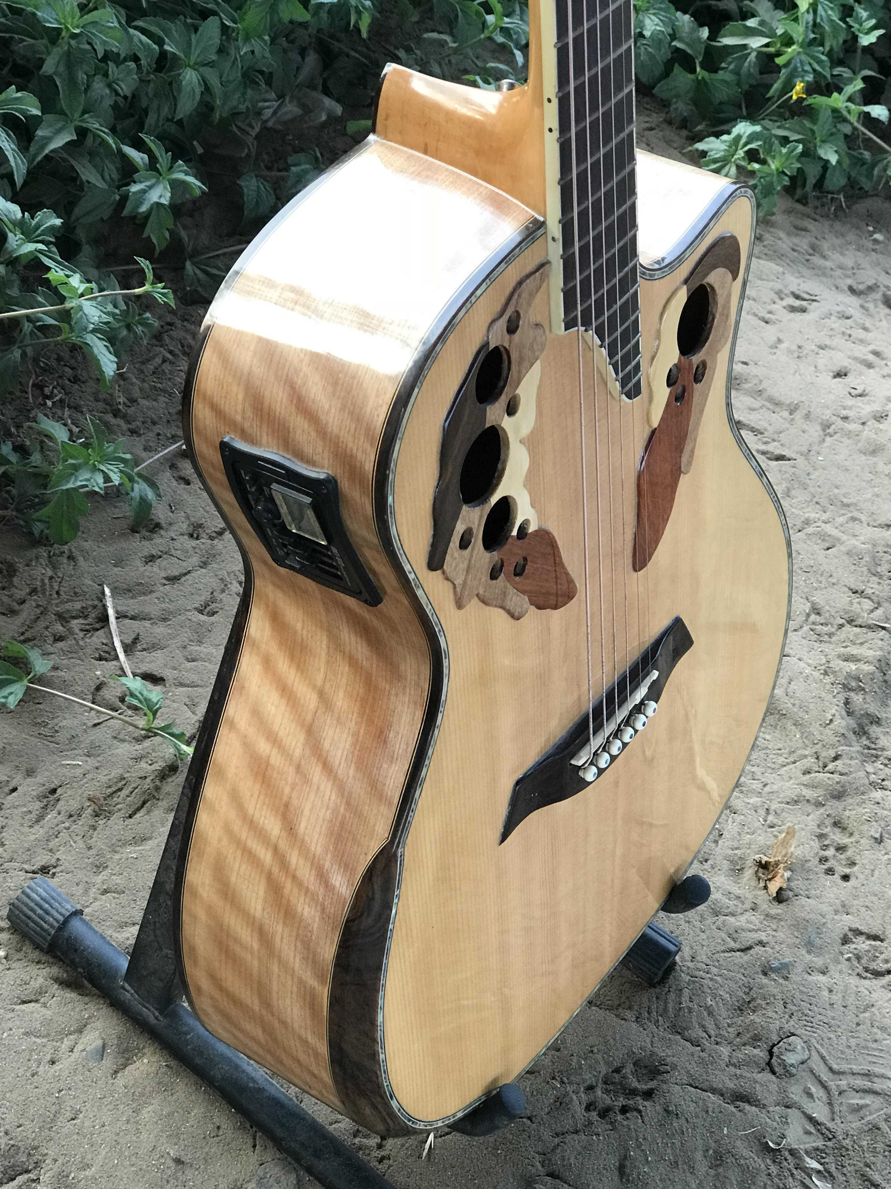 GUITAR ACOUSTIC OVANTION GỖ CÒNG CƯỜM DÁNG A KHUYẾT VÁT TAY