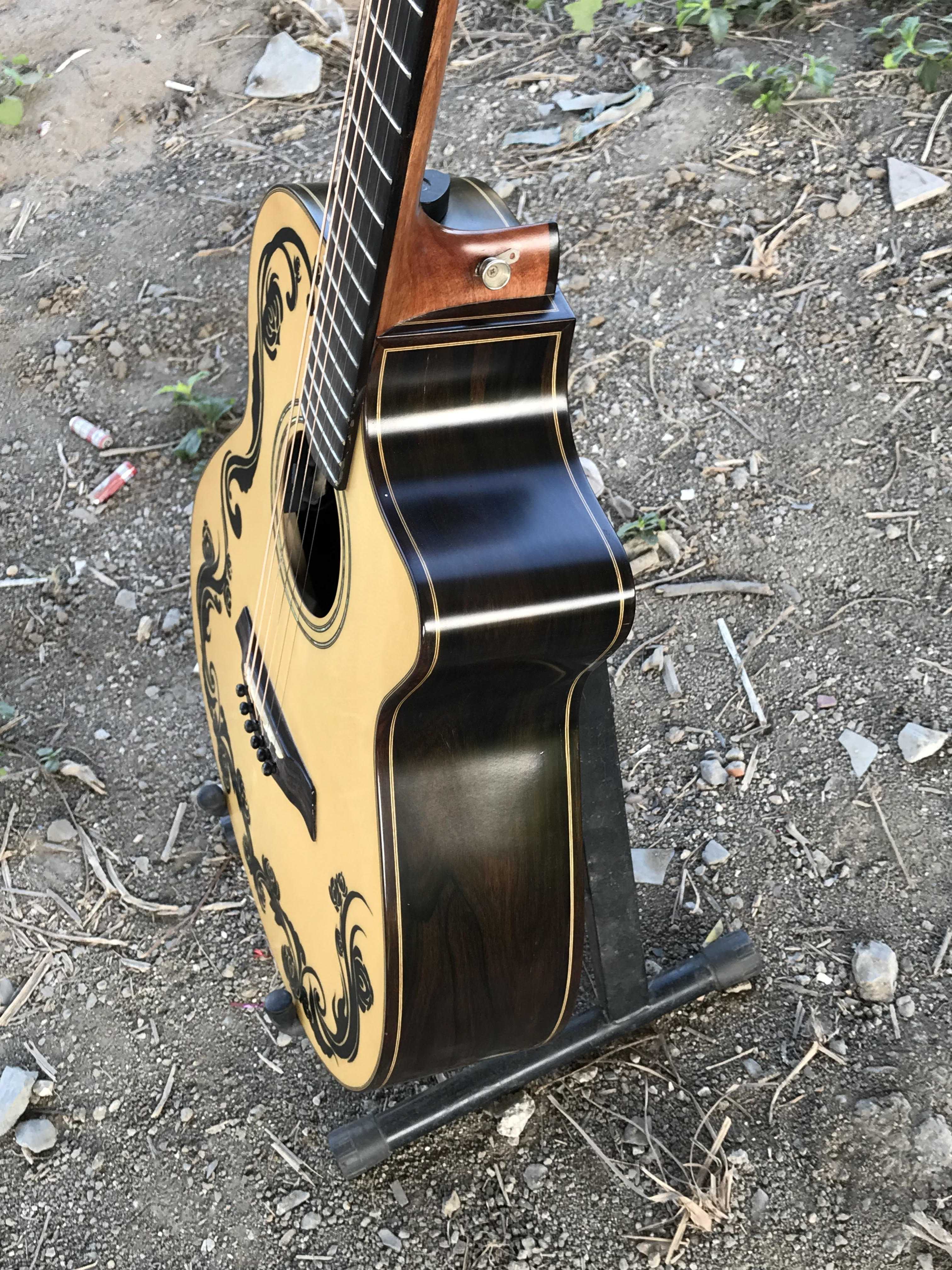 GUITAR ACOUSTIC GỖ ZINCOTE DÁNG A KHUYẾT