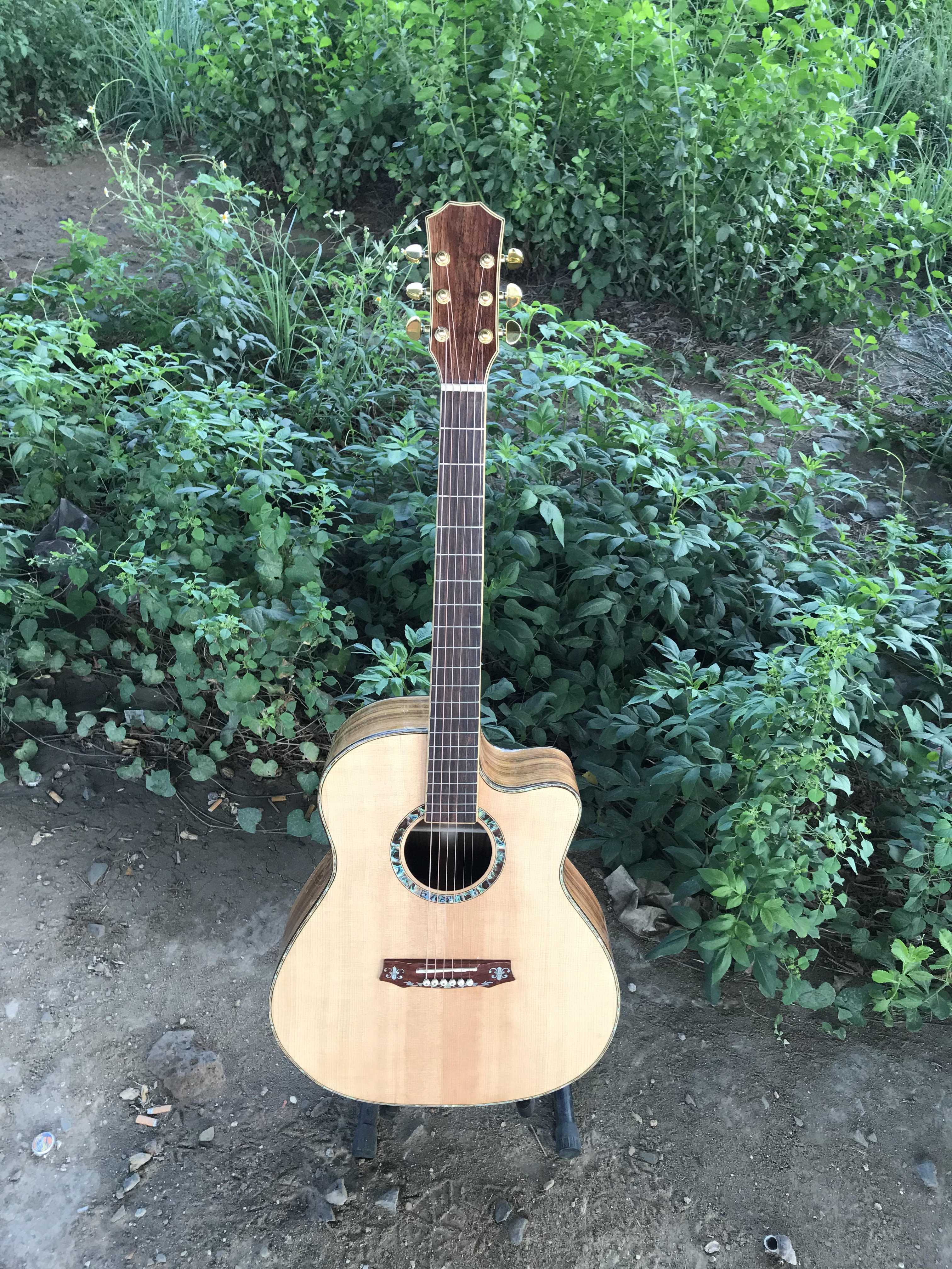 GUITAR ACOUSTIC GỖ OVANKOL DÁNG A KHUYẾT CẨN XÀ CỪ Thông số kỹ thuật: 