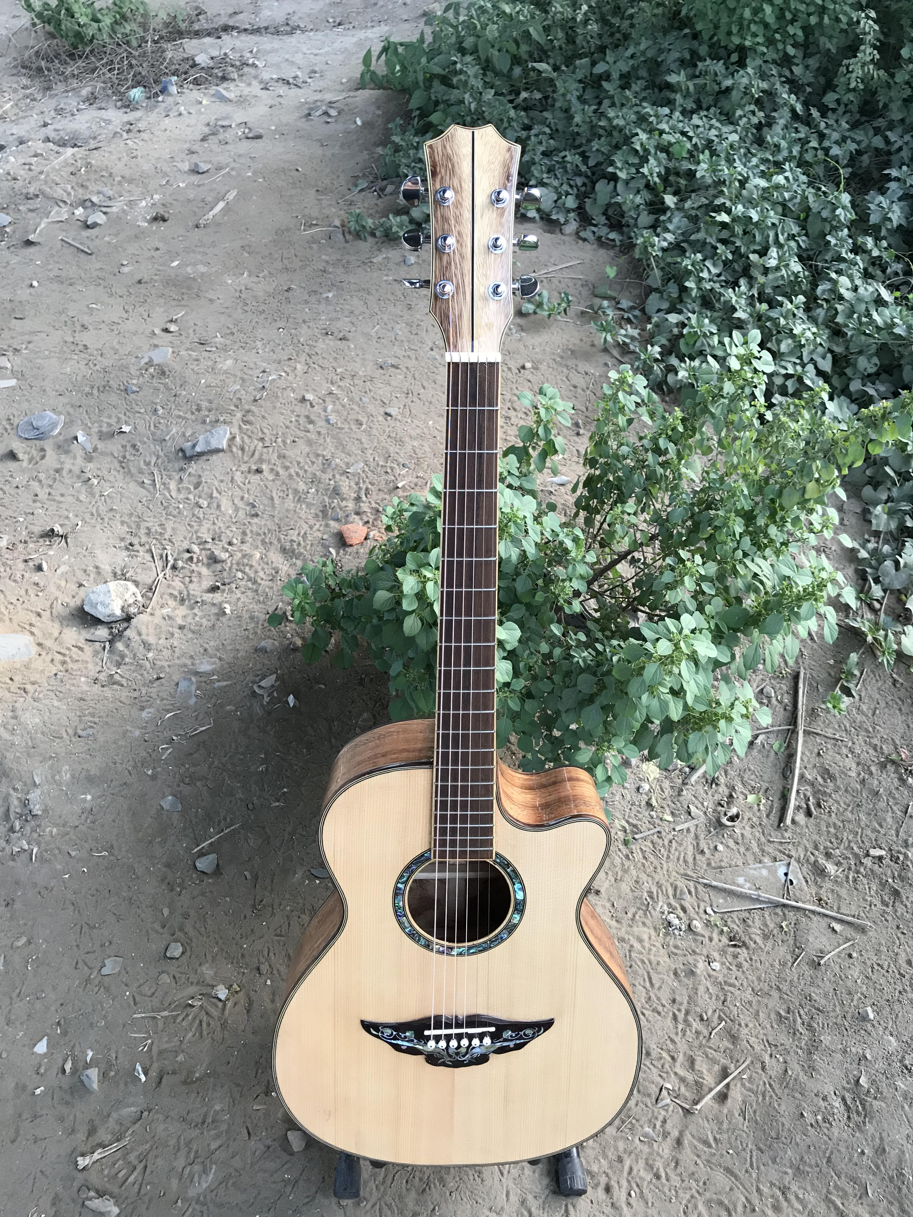 GUITAR ACOUSTIC GỖ ĐIỆP DÁNG A KHUYẾT CẨN ỐC VIP